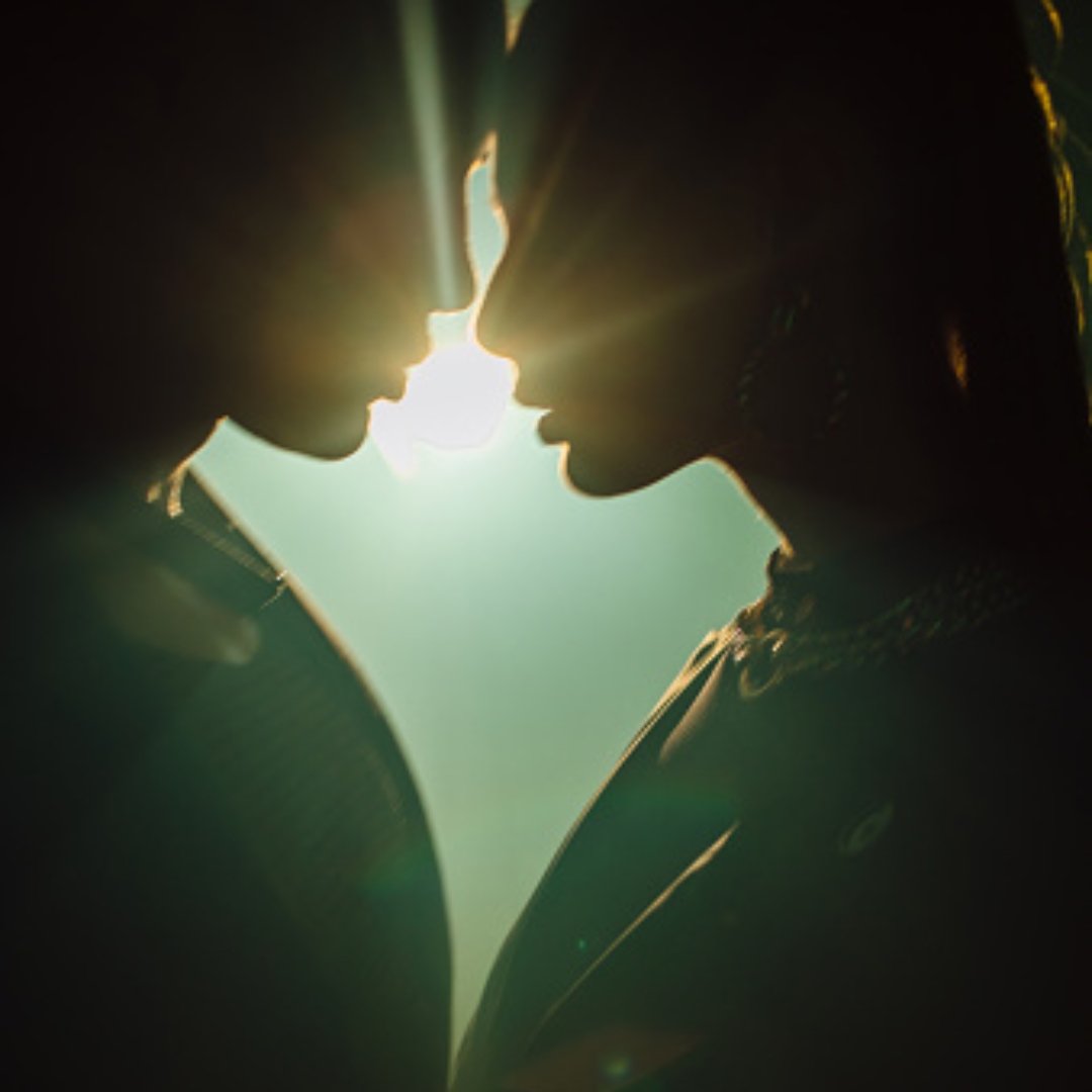 a silhouette of a man and woman